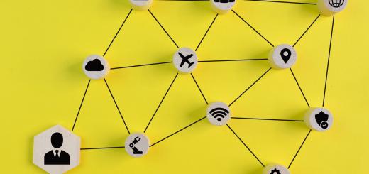 Illustration of lots of things associated with a contact (plane, wifi symbol, other people, location, web, security shield, settings, reports) connected with a black line to the user and each other. Yellow background, the things are all wooden circles with black symbols.