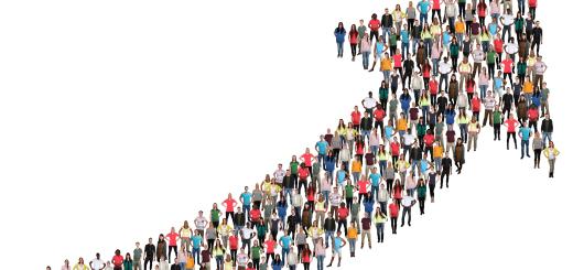 An image of lots of individual multicultural people standing in the shape of an upward facing arrow